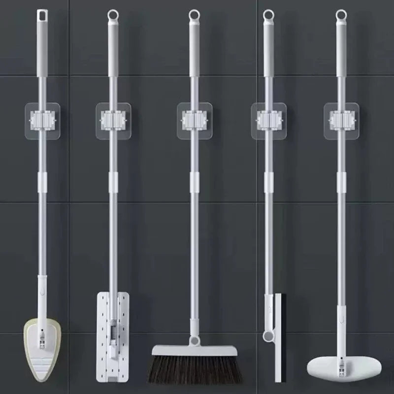 Wall-Mounted Mop & Broom Holder – Storage rack with hooks.