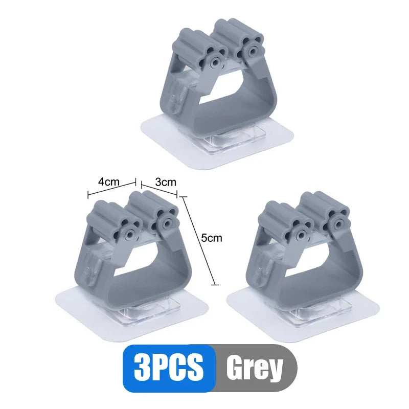 Wall-Mounted Mop & Broom Holder – Storage rack with hooks.